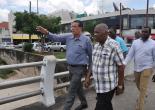 Chairman of the Tourism Enhancement Fund (TEF), Godfrey Dyer (front right), observes as Mayor of Montego Bay, Councillor Homer Davis (front left), gestures. Two were on a tour of sections of Montego Bay to observe the progress of the Sidewalk Rehabilitation Programme on Monday, August 21, 2017. Superintendent of Roads and Works (Acting) Saad Campbell (right) and Deputy Mayor of Montego Bay, Councillor Leeroy Williams also participated in the tour.